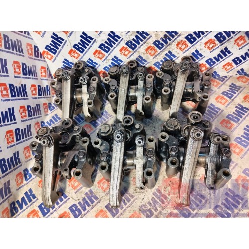 Ось коромысел DAF 105 в сборе (с рокерами и горняком) (702)*-4